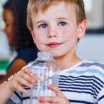 kid-drinking-water-at-school