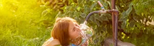 kid-drinking-water-from-tap
