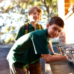 2 childs drinking school water