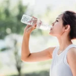 asian girl drinking water