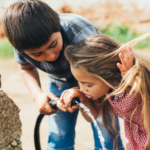 boy and girl drinking water