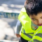 child drinking public water