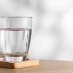 glass of water on wood table