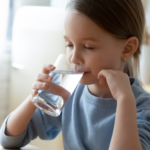 little girl drinking water