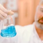 old scientist with pfas samples