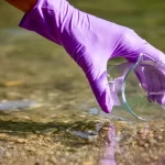 taking samples from river