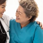 asian young doctor with old woman