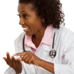 black woman doctor with patient
