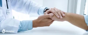 doctor checking patient hand