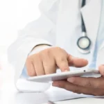 doctor showing results on tablet