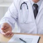 doctor speaking with one patient