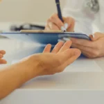 doctor speaking with patient