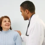 doctor with woman at consult