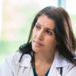 female doctor with female patient