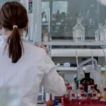 female scientist in laboratory testing water 2