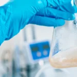 female scientist in laboratory testing water 3