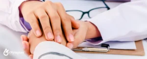 male doctor checking hand