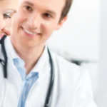 male doctor with female patient