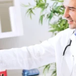 male doctor with male patient