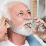 old couple drinking water
