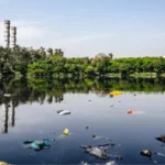 plastic pollution on river from factory