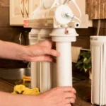 plumber changing water filter 6