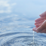 river water with hands