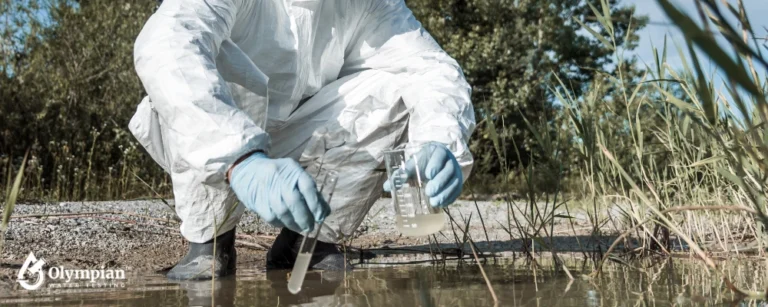scientist checking pollution river