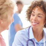 smilling woman doctor with stethoscope