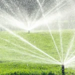 spraying water on field 15