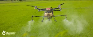 spraying water on field from drone