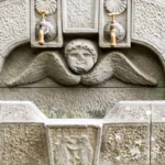 stone public water fountain