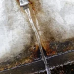 water from pipe in public