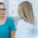 woman doctor and patient in hospital