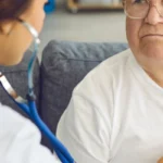 woman doctor checking with stethoscope