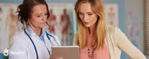 woman doctor showing results to patient