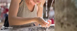 woman drinking public water
