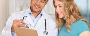 young doctor showing results to patient