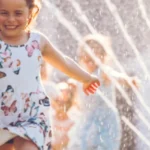 kids playing in public fountain 3