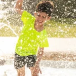 kids playing in public fountain 4
