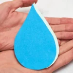paper water drop in hands