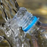 taking spring water with bottle 4