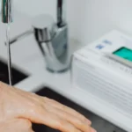 wasing hands from tap