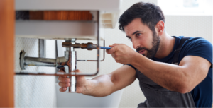 plumber-fixing-lead-pipe