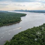 Hudson River aerial view with PFAS chemical structure overlay. Water testing.