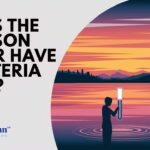 Hudson River bacteria testing. Water sample being taken at sunset for bacteria analysis.