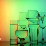 Water shelf life: Various glasses filled with water against a colorful background.