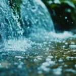 Clear water flowing. Olympian Water Testing logo. Fresh, clean water concept.