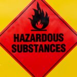 Hazardous substances warning sign. PFAS chemicals in NYC drinking water may pose health risks.