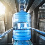 how many bottles of water equals a gallon of water